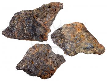macro shooting of specimen natural rock - three pieces of psilomelane (black hematite) mineral stone isolated on white background