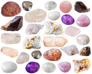 macro shooting of collection natural rock - various quartz mineral gem stones and crystals isolated on white background