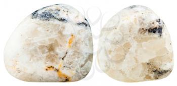 macro shooting of natural mineral stone - two tumbled Baryte (barite) gemstones isolated on white background