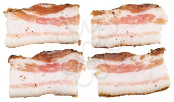 four pieces of speck isolated on white background