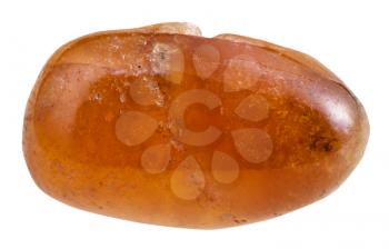 macro shooting of natural gemstone - tumbled spessartine mineral gem stone isolated on white background