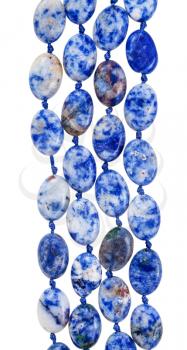 beads from blue lazurite gem stone isolated on white background