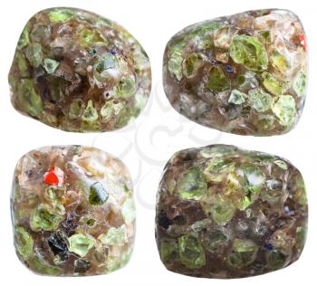 set of polished peridot (Chrysolite, olivine) mineral stones isolated on white background