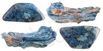 set of rhodusite (blue asbestos, riebeckite) mineral stone and polished gemstones isolated on white background