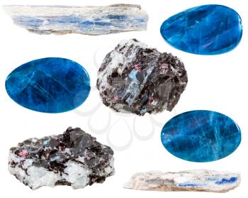 set of kyanite crystals and polished mineral gemstones isolated on white background