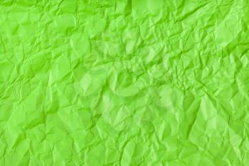 background from green colour crumpled paper