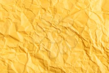 background from yellow colour crumpled paper