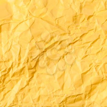 square background from yellow colour crumpled paper