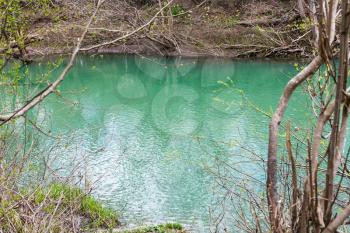 green water in glacial river Abin in caucasus mountain in spring