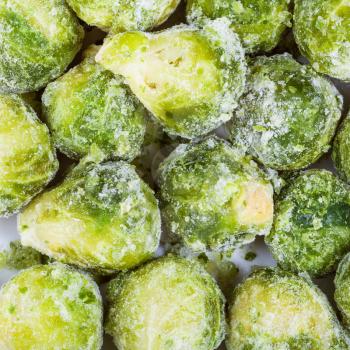 above view of many frozen Brussels sprouts cabbageheads