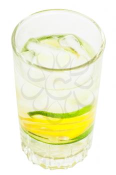 above view of glass tumbler with cold lemonade drink from lemon and lime isolated on white background