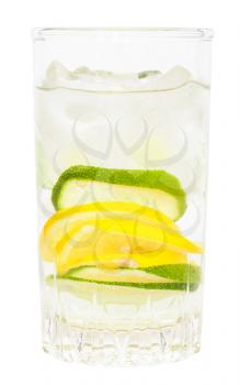 glass tumbler with cold lemonade drink from lemon and lime isolated on white background