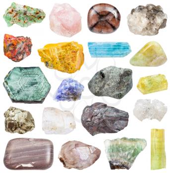 set of various mineral stones: tanzanite, zoisite, apatite, orpiment, fluorite, hematite, phlogopite, datolite, suevite, danburite, halite, petalite, beryl, edenite, realgar, etc isolated on white