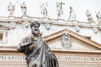 travel to Italy - Sculpture of Saint Peter in front of St Peter's Basilica on piazza San Pietro in Vatican city