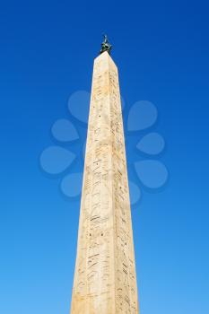 travel to Italy - Lateran Obelisk, ancient Egyptian obelisk (Obelisco Lateranense) and blue sky in Rome city (square Piazza San Giovanni Laterano)