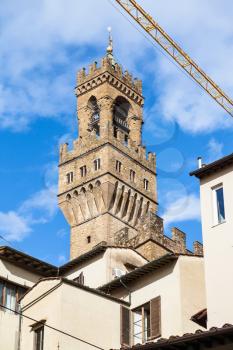 travel to Italy - tower of Palazzo Vecchio over houses in Florence city