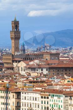 travel to Italy - above view of Florence town with Palazzo Vecchio from Piazzale Michelangelo