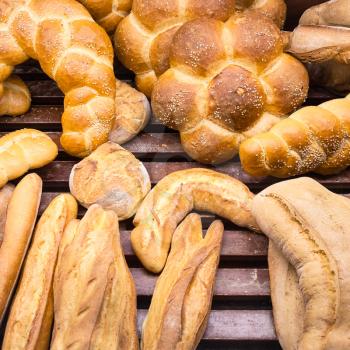 travel to Italy, italian cuisine - fresh baked breads in baker shop in Sicily