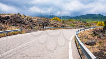 travel to Italy - road on Etna mount in Sicily in summer day