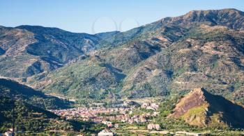travel to Italy - above view of Francavilla di Sicilia town in mountain valley in Sicily