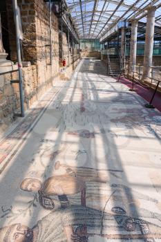 PIAZZA ARMERINA, ITALY - JUNE 29, 2011: hall of Villa Romana del Casale. This ancient villa was built in the first quarter of the 4th century and located near Piazza Armerina town in Sicily