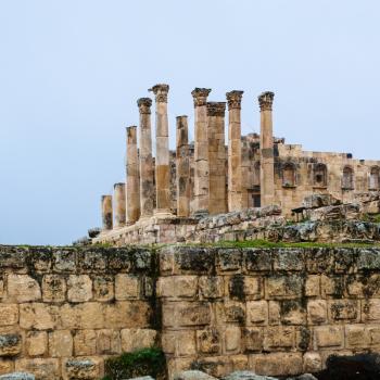 Travel to Middle East country Kingdom of Jordan - view of Temple of Zeus in Jerash (ancient Gerasa) town in winter rain
