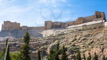 Travel to Middle East country Kingdom of Jordan - bottom view of Kerak Castle in sunny winter day