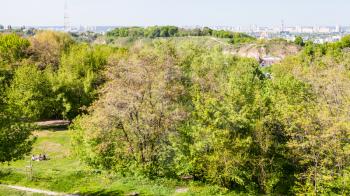 travel to Ukraine - view of urban public park on Gonchary-Kozhemyaki tract in Kiev city near Landscape alley in spring