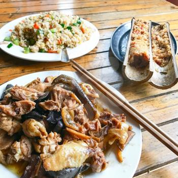 travel to China - local dinner with chicken and mushrooms in rustic eatery in area Dazhai Longsheng Rice Terraces (Dragon's Backbone terrace, Longji Rice Terraces) country in spring