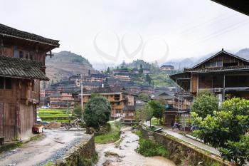 DAZHAI, CHINA - MARCH 23, 2017: view of Dazhai Longsheng village in spring. This is central village in famous scenic area of Longji Rice Terraces in China