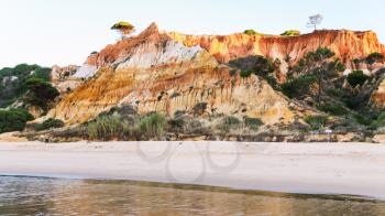Travel to Algarve Portugal - beach Praia Falesia near Albufeira city in evening