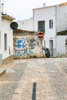 LAGOS, PORTUGAL - JUNE 18, 2006: typical street in old town of Lagos. Lagos is one of the most visited cities in the Algarve and Portugal due to its Atlantic Ocean beaches