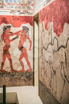 ATHENS, GREECE - SEPTEMBER 12, 2007: The boxing boys fresco from Thera in National Archaeological Museum. The museum is house some of important artifacts from archaeological locations around Greece
