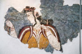 ATHENS, GREECE - SEPTEMBER 12, 2007: ancient minoan fresco from Thera in National Archaeological Museum. The museum is house some of the important artifacts from archaeological locations around Greece