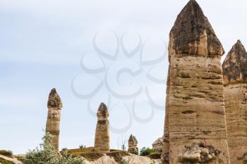 Travel to Turkey - several fairy chimney rocks in Goreme National Park in Cappadocia in spring