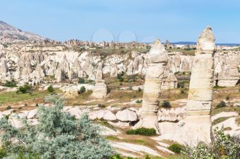 Travel to Turkey - landscape with old fairy chimney rocks in mountains of Goreme National Park in Cappadocia in spring