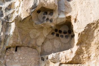 Travel to Turkey - old rock-carved room in Goreme town in Cappadocia in spring