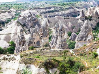 Travel to Turkey - old rock-cut houses in Goreme National Park in Cappadocia in spring