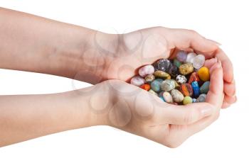 many various gems in handful isolated on white background