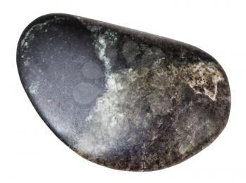 macro shooting of natural mineral rock specimen - pebble of olivinite stone isolated on white background from Kovdor region, Kola Peninsula, Russia