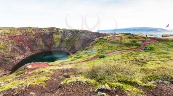 travel to Iceland - panoramic view of Kerid lake in volcanic crater in september evening