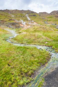 travel to Iceland - geysers and hot water stream in Hveragerdi Hot Spring River Trail area in september