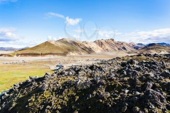 travel to Iceland - view of valley with camp in Landmannalaugar area of Fjallabak Nature Reserve in Highlands region of Iceland in september