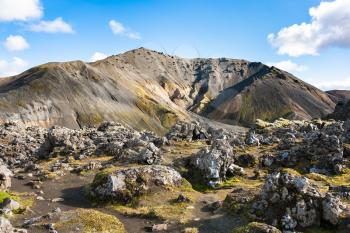 travel to Iceland - volcano and at Laugahraun volcanic lava field in Landmannalaugar area of Fjallabak Nature Reserve in Highlands region of Iceland in september