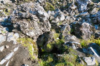 travel to Iceland - old rocks at Laugahraun volcanic lava field in Landmannalaugar area of Fjallabak Nature Reserve in Highlands region of Iceland in september