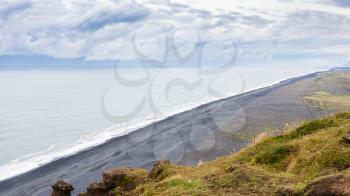 travel to Iceland - above view of Solheimafjara beach from Dyrholaey peninsula near Vik I Myrdal village on Atlantic South Coast in Katla Geopark in september