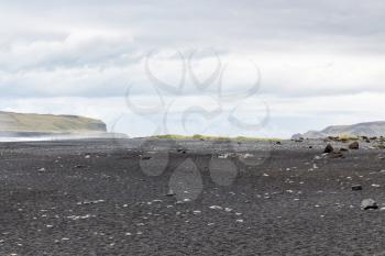 travel to Iceland - surface of Reynisfjara black sand beach in Iceland, near Vik I Myrdal village on Atlantic South Coast in Katla Geopark in september