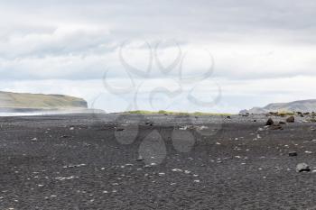 travel to Iceland - surface of Reynisfjara black sand beach in Iceland, near Vik I Myrdal village on Atlantic South Coast in Katla Geopark in september