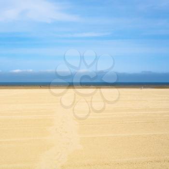 travel to France - blue sky over yellow sand beach of Le Touquet (Le Touquet-Paris-Plage) on coast of English Channel