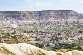 Travel to Turkey - above view of town in mountain valley in Cappadocia in spring